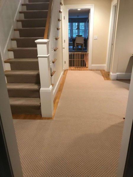 Wood stairs with carpet runner